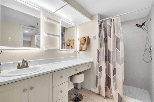 6713 Stone River Rd Unit 101, Bradenton, FL 34203 - full bath with vanity, a tile shower, and tile patterned flooring