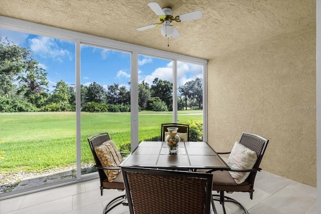 6713 Stone River Rd Unit 101, Bradenton, FL 34203 - sunroom / solarium featuring ceiling fan and outdoor dining space