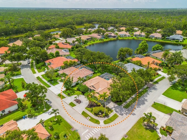471 Park Trace Blvd, Osprey, FL 34229 - aerial perspective of suburban area with a forest and a large body of water
