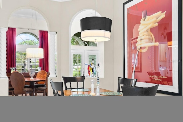471 Park Trace Blvd, Osprey, FL 34229 - dining space featuring decorative columns
