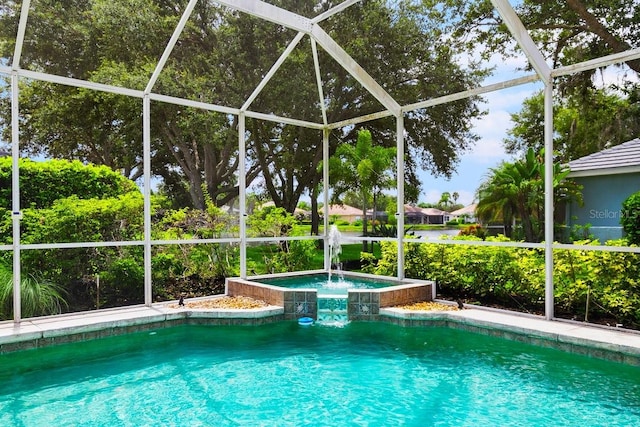 471 Park Trace Blvd, Osprey, FL 34229 - view of swimming pool featuring a lanai and a pool with connected hot tub