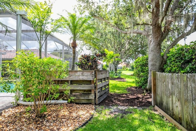 471 Park Trace Blvd, Osprey, FL 34229 - view of yard featuring a lanai