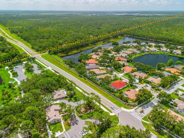 471 Park Trace Blvd, Osprey, FL 34229 - drone / aerial view of a forest and a nearby body of water