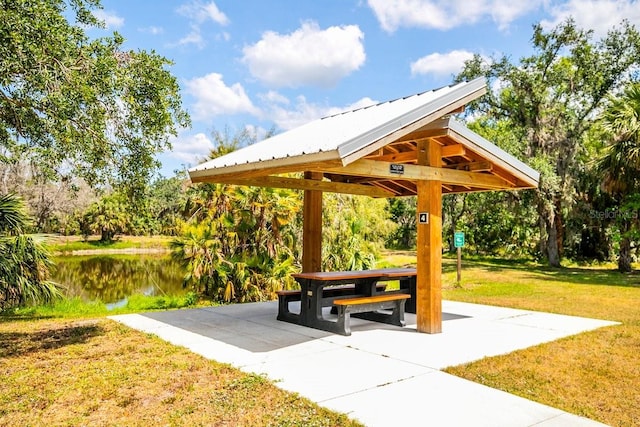 471 Park Trace Blvd, Osprey, FL 34229 - surrounding community with a gazebo, a lawn, and a water view