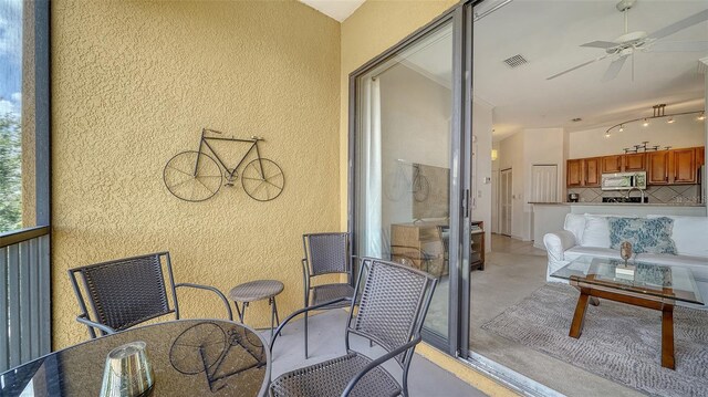 8397 38th Street Cir E Unit 306, Sarasota, FL 34243 - balcony featuring ceiling fan