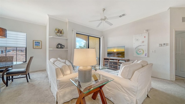 8397 38th Street Cir E Unit 306, Sarasota, FL 34243 - living area featuring light carpet, crown molding, and a ceiling fan