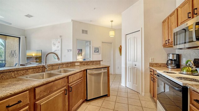 8397 38th Street Cir E Unit 306, Sarasota, FL 34243 - kitchen featuring appliances with stainless steel finishes, brown cabinets, light tile patterned floors, hanging light fixtures, and decorative backsplash