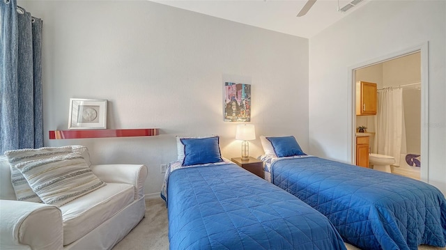 8397 38th Street Cir E Unit 306, Sarasota, FL 34243 - bedroom with carpet floors, ensuite bathroom, and ceiling fan