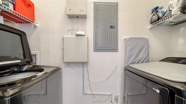 8397 38th Street Cir E Unit 306, Sarasota, FL 34243 - washroom with electric panel, independent washer and dryer, and water heater