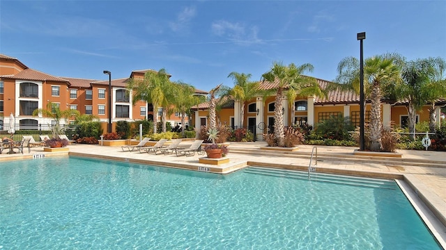 8397 38th Street Cir E Unit 306, Sarasota, FL 34243 - community pool featuring a patio