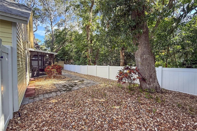 6818 Arbor Oaks Cir, Bradenton, FL 34209 - fenced backyard featuring a sunroom