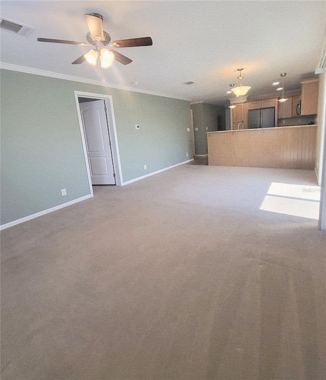 1106 49th Avenue Dr W, Bradenton, FL 34207 - unfurnished living room featuring ornamental molding, ceiling fan, and carpet flooring