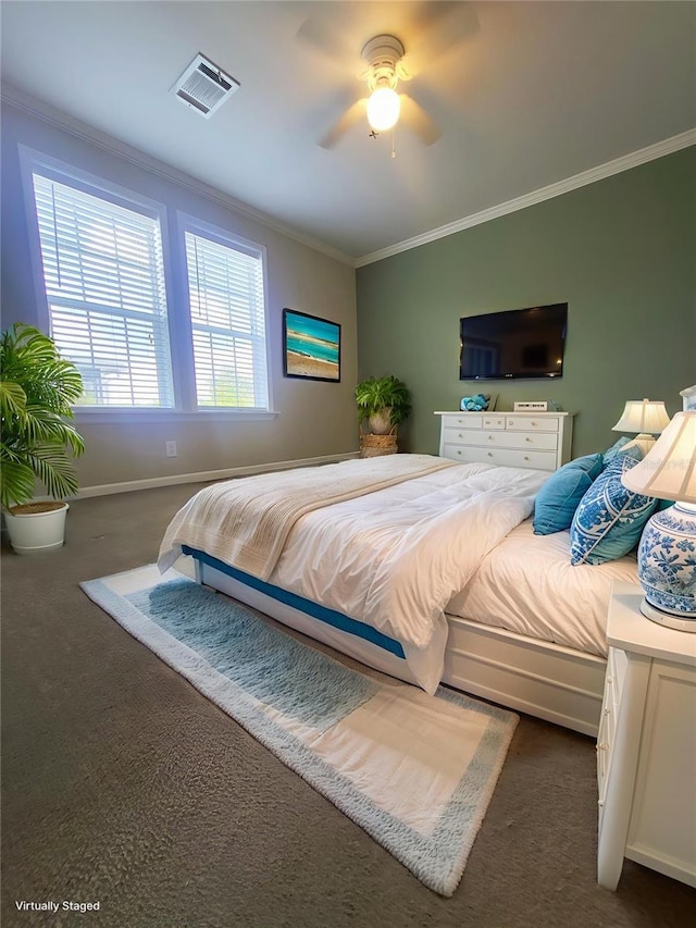 1106 49th Avenue Dr W, Bradenton, FL 34207 - bedroom with dark colored carpet, ornamental molding, and a ceiling fan
