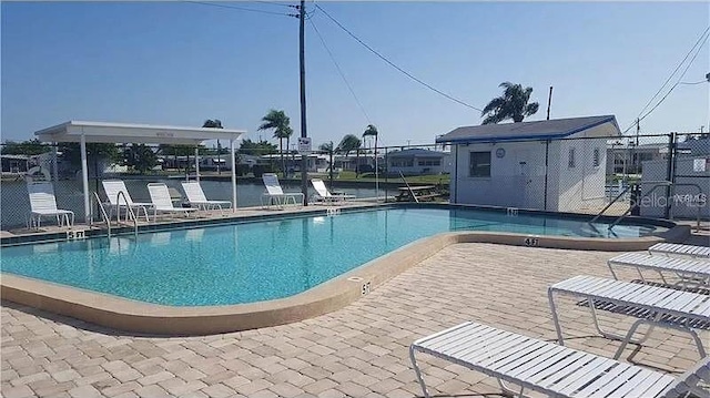 1106 49th Avenue Dr W, Bradenton, FL 34207 - community pool featuring a patio area