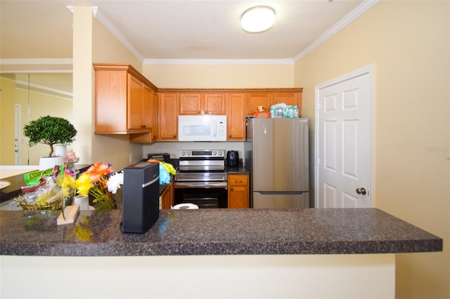 4802 51st St W Unit 1310, Bradenton, FL 34210 - kitchen featuring stainless steel appliances, a peninsula, ornamental molding, and dark countertops