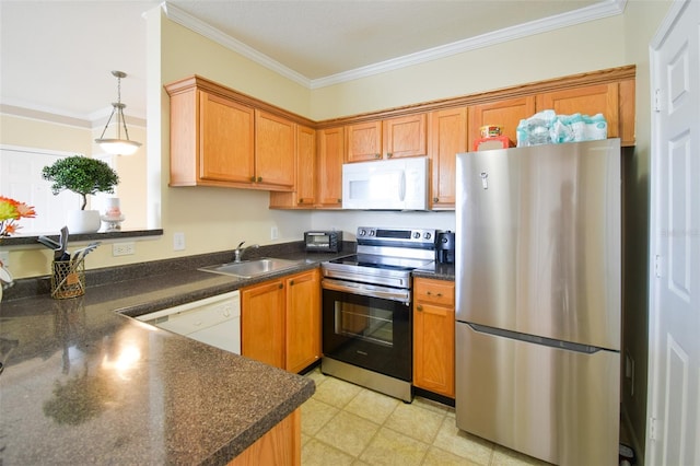4802 51st St W Unit 1310, Bradenton, FL 34210 - kitchen featuring stainless steel appliances, dark countertops, ornamental molding, brown cabinetry, and decorative light fixtures