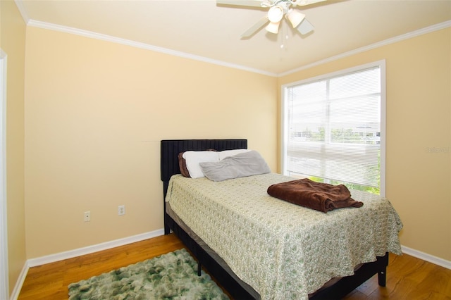 4802 51st St W Unit 1310, Bradenton, FL 34210 - bedroom with crown molding, wood finished floors, and a ceiling fan