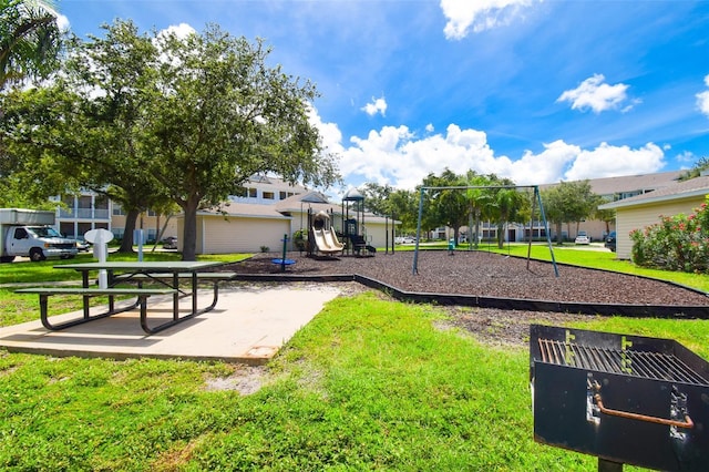 4802 51st St W Unit 1310, Bradenton, FL 34210 - communal playground featuring a lawn