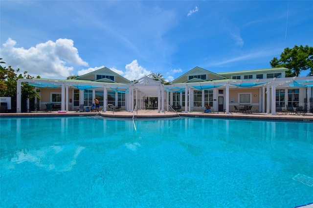 4802 51st St W Unit 1310, Bradenton, FL 34210 - community pool with a pergola and a patio