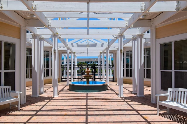 4802 51st St W Unit 1310, Bradenton, FL 34210 - view of patio / terrace featuring a pergola