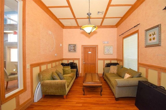 4802 51st St W Unit 1310, Bradenton, FL 34210 - living area featuring wood finished floors, crown molding, and wainscoting
