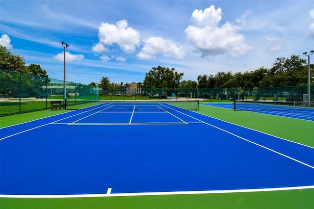 4802 51st St W Unit 1310, Bradenton, FL 34210 - view of tennis court with community basketball court