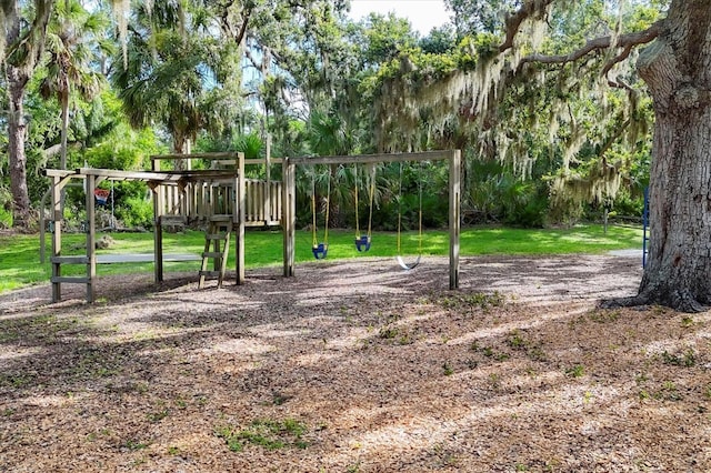 4658 Longwater Chase Unit 104, Sarasota, FL 34235 - communal playground with a yard