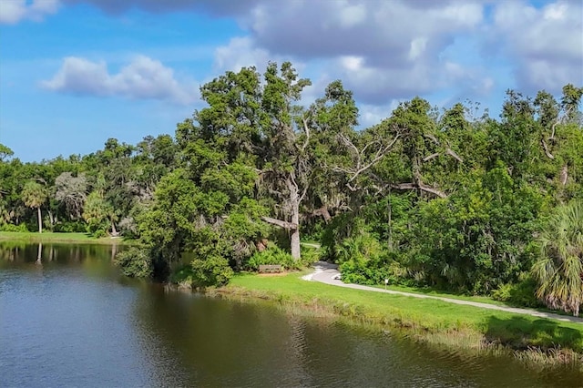 4658 Longwater Chase Unit 104, Sarasota, FL 34235 - water view featuring a heavily wooded area