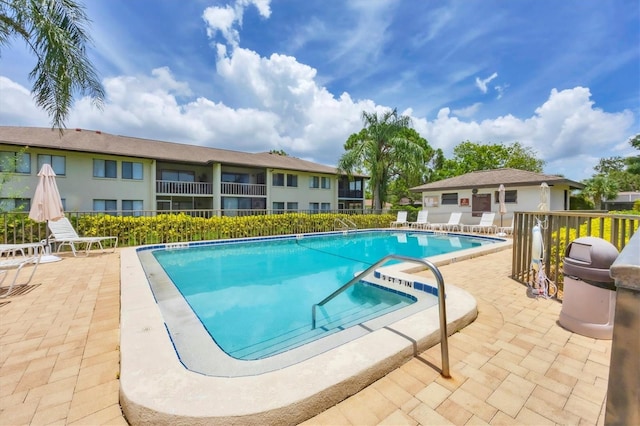 4658 Longwater Chase Unit 104, Sarasota, FL 34235 - community pool with a patio and a hot tub