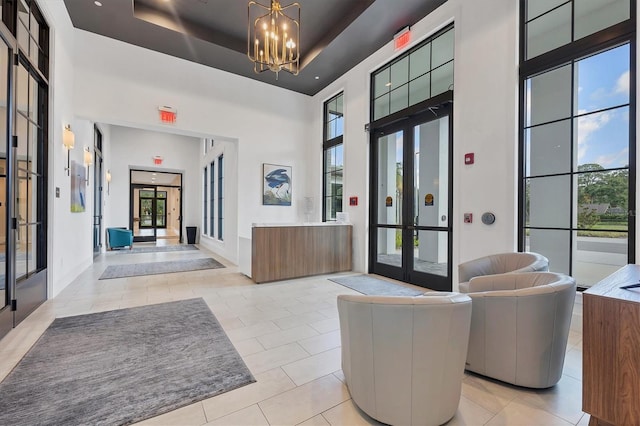 4658 Longwater Chase Unit 104, Sarasota, FL 34235 - common area with a towering ceiling