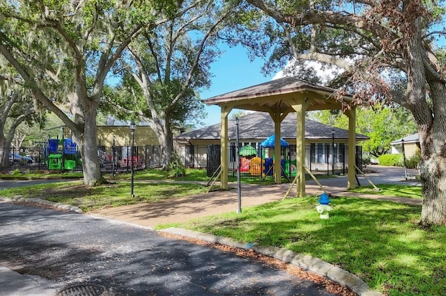 4658 Longwater Chase Unit 104, Sarasota, FL 34235 - view of community with a lawn