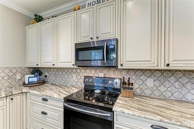 3911 91st Ave E, Parrish, FL 34219 - kitchen with stainless steel microwave, electric stove, decorative backsplash, light stone counters, and crown molding