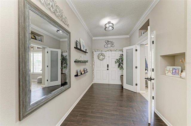 3911 91st Ave E, Parrish, FL 34219 - foyer entrance featuring ornamental molding, dark wood finished floors, and a textured ceiling