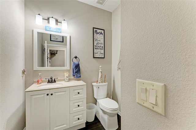 3911 91st Ave E, Parrish, FL 34219 - bathroom with vanity and wood finished floors