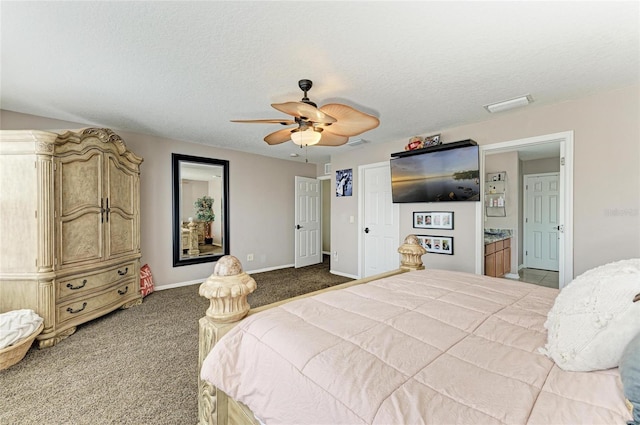 3911 91st Ave E, Parrish, FL 34219 - carpeted bedroom with ceiling fan, a textured ceiling, and ensuite bathroom