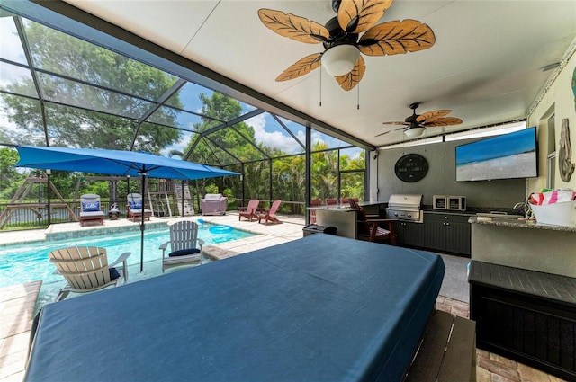 3911 91st Ave E, Parrish, FL 34219 - outdoor pool featuring exterior kitchen, outdoor dining space, a patio, a lanai, and ceiling fan