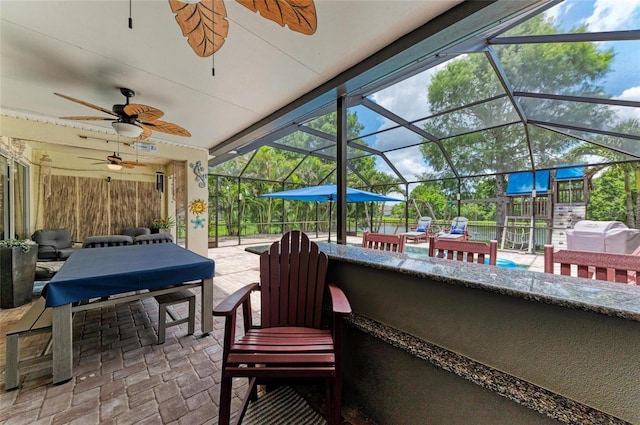 3911 91st Ave E, Parrish, FL 34219 - view of patio with ceiling fan, grilling area, and a lanai