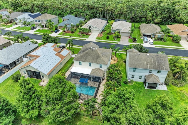 3911 91st Ave E, Parrish, FL 34219 - aerial view of residential area with a pool area
