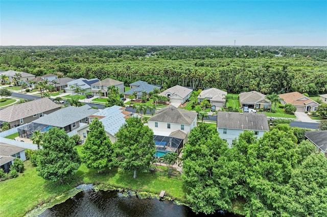 3911 91st Ave E, Parrish, FL 34219 - aerial view of residential area featuring a forest