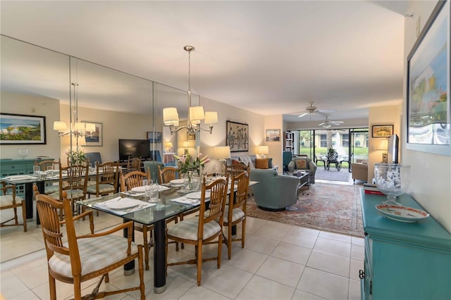 5705 Ashton Way Unit 5705, Sarasota, FL 34231 - dining room featuring a chandelier, light tile patterned floors, and a ceiling fan