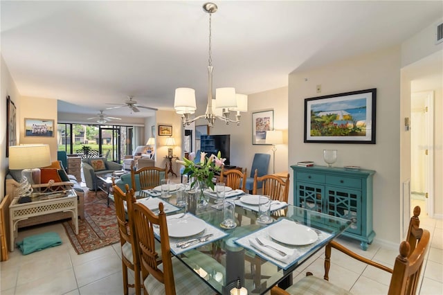 5705 Ashton Way Unit 5705, Sarasota, FL 34231 - dining room with ceiling fan, light tile patterned floors, and a chandelier