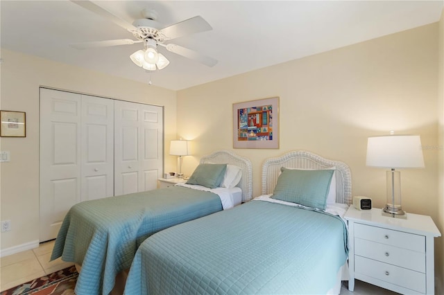 5705 Ashton Way Unit 5705, Sarasota, FL 34231 - bedroom with a closet, tile patterned flooring, and a ceiling fan