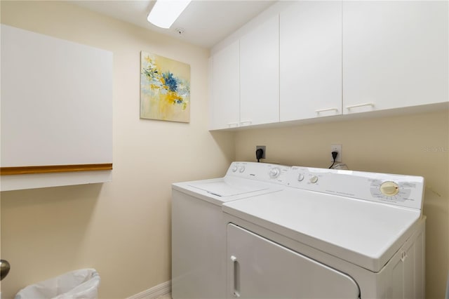 5705 Ashton Way Unit 5705, Sarasota, FL 34231 - laundry room with cabinet space and independent washer and dryer