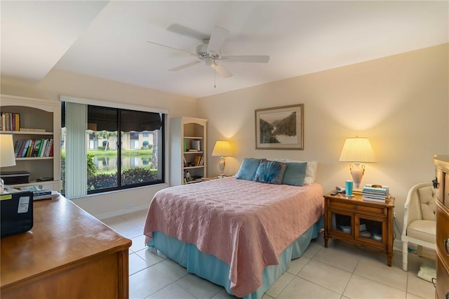 5705 Ashton Way Unit 5705, Sarasota, FL 34231 - bedroom with light tile patterned floors and ceiling fan