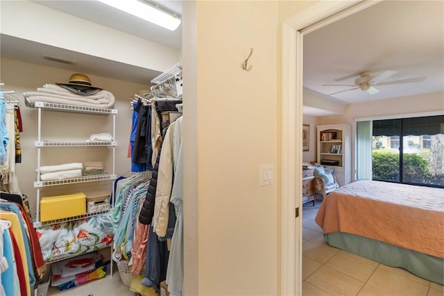5705 Ashton Way Unit 5705, Sarasota, FL 34231 - walk in closet featuring tile patterned floors and ceiling fan