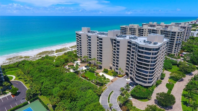 1211 Gulf Of Mexico Dr Unit 105, Longboat Key, FL 34228 - drone / aerial view of waterfront with a beach and apartment complex