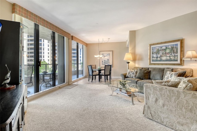 1211 Gulf Of Mexico Dr Unit 105, Longboat Key, FL 34228 - living area with a chandelier and carpet