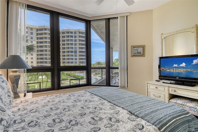 1211 Gulf Of Mexico Dr Unit 105, Longboat Key, FL 34228 - bedroom featuring multiple windows
