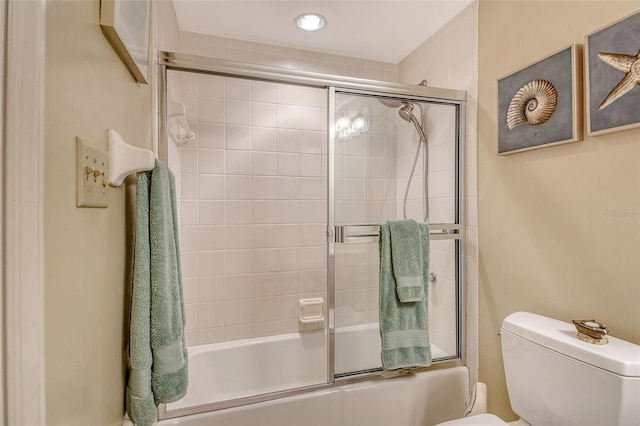 1211 Gulf Of Mexico Dr Unit 105, Longboat Key, FL 34228 - bathroom with combined bath / shower with glass door and recessed lighting