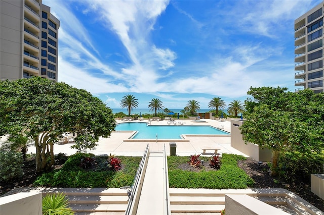 1211 Gulf Of Mexico Dr Unit 105, Longboat Key, FL 34228 - community pool featuring a patio